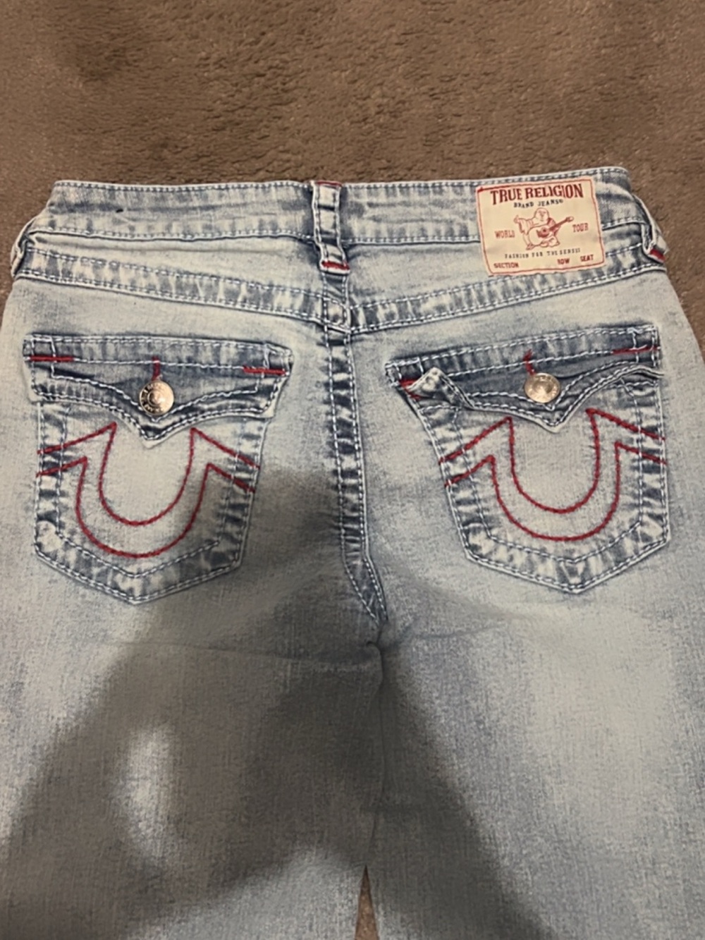 True Religion Light Blue Boot Cut Jeans with Red Pocket Stitching